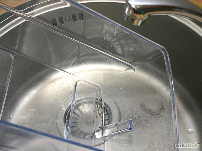 Cách khử mùi hôi tanh trong tủ lạnh do đựng cá - 9